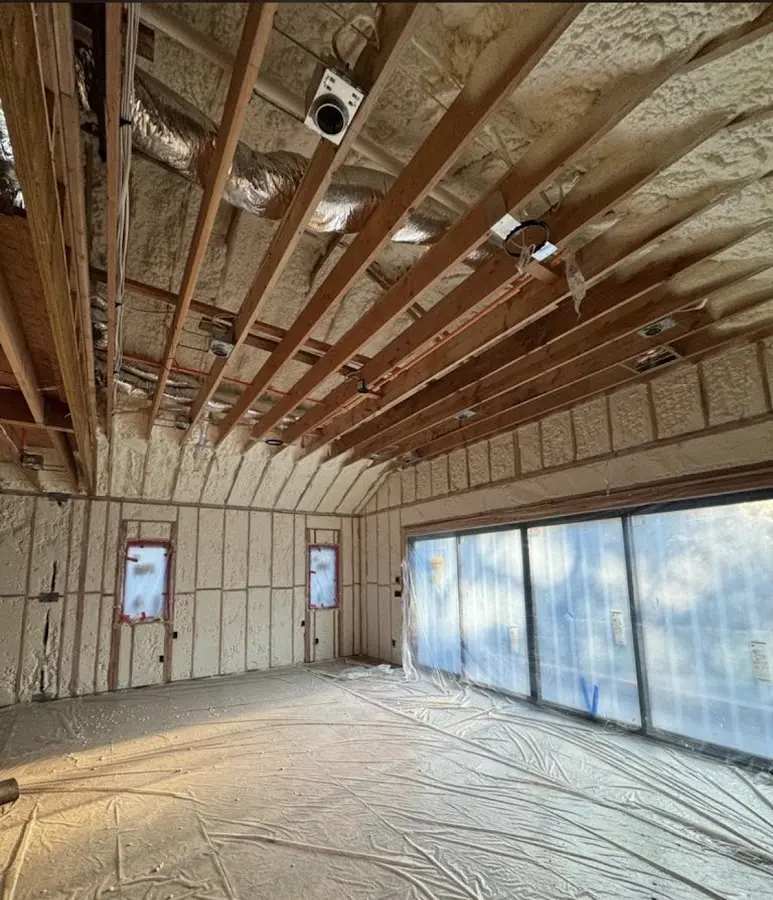 Interior walls and ceiling insulated with spray foam during new construction in Portland